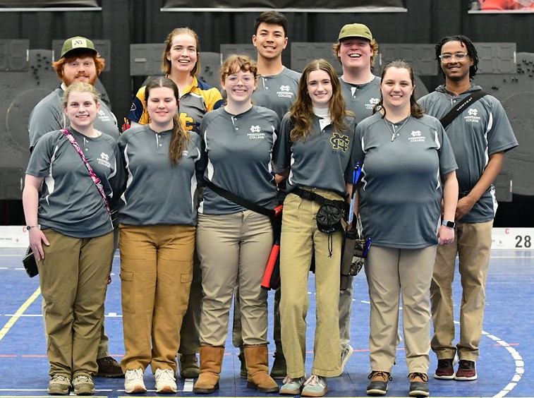 MC archers preparing to compete in the Outdoor Regionals include, front row from left, Isabella Hedgepeth, Gracen Lancaster, Christina Glover, Ann Mabry Dean and Amy Snyder, and back row from left, McClain Boyd, Abigail Veidmark, Jack Thomas Spears, Jude Counce and Isakiel Griffin.