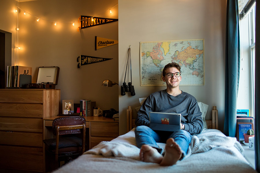 Student in his dorm room